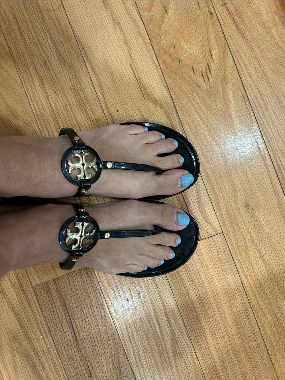 Tory Burch Black Jelly Thong Sandals with Gold Logo Medallion